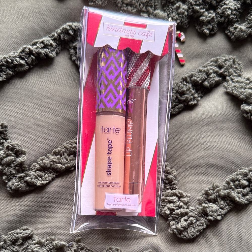 Tarte Shape Tape Concealer and Maracuja juicy lip plump  with the sparkly top.